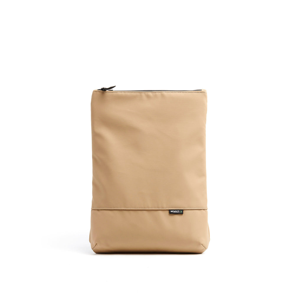 Mueslii light backpack,  made of PU coated waterproof nylon, with a laptop compartment, color sand, front view.