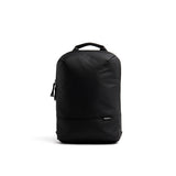 Mueslii small backpack, made of PU coated waterproof nylon, with a laptop compartment, color coal black, front view.